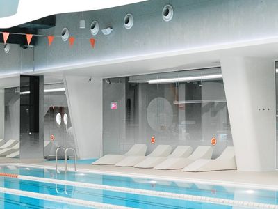 Modern interior of a training facility with blue lights